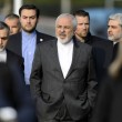 Iranian Foreign Minister Mohammad Javad Zarif, center, walks outside the hotel during a break during a bilateral meeting with U.S. Secretary of State John Kerry  for a new round of Nuclear Talks, in Lausanne, Switzerland, Friday, March 20, 2015. (AP Photo/Keystone,Laurent Gillieron)